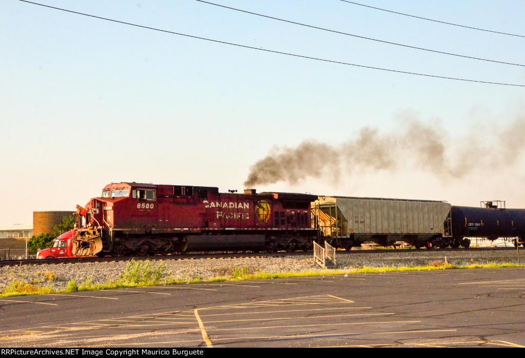 CP AC44CW Locomotive leading a train